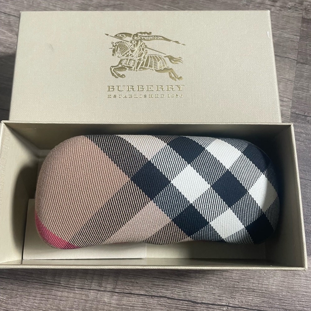 Burberry case and cleaning cloth.